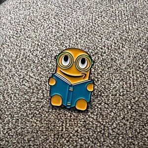 Amazon Peccy reading Enamel Pin with Teal Book